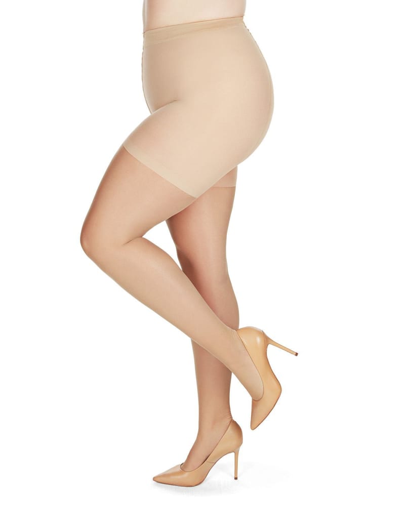 Side of a model wearing a size Q1 Crystal Sheer Shaper Control Top Tights in Honey by Memoi. | dia_product_style_image_id:299836